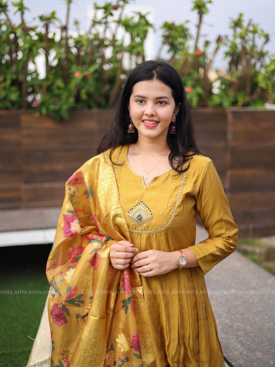 Mustard semi silk Anarkali top with palazzo pants paired with floral organza shawl