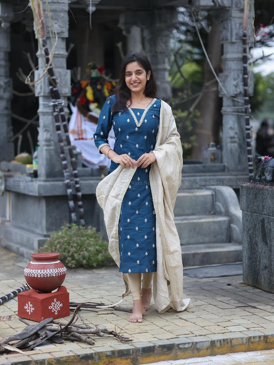 Ink blue raw silk Kurti with crystal lace work paired with silver tissue shawl