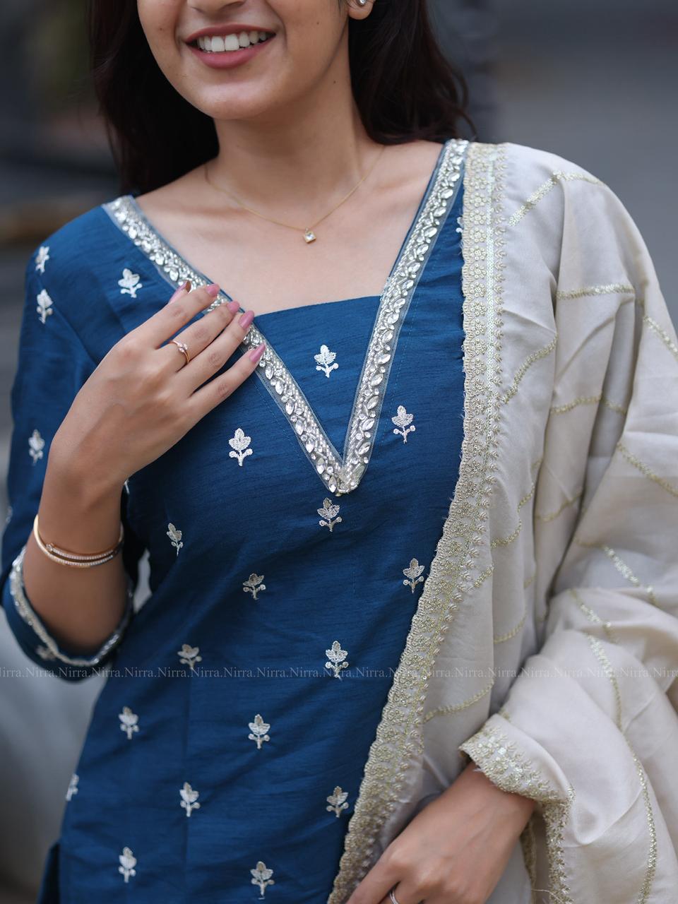 Ink blue raw silk Kurti with crystal lace work paired with silver tissue shawl