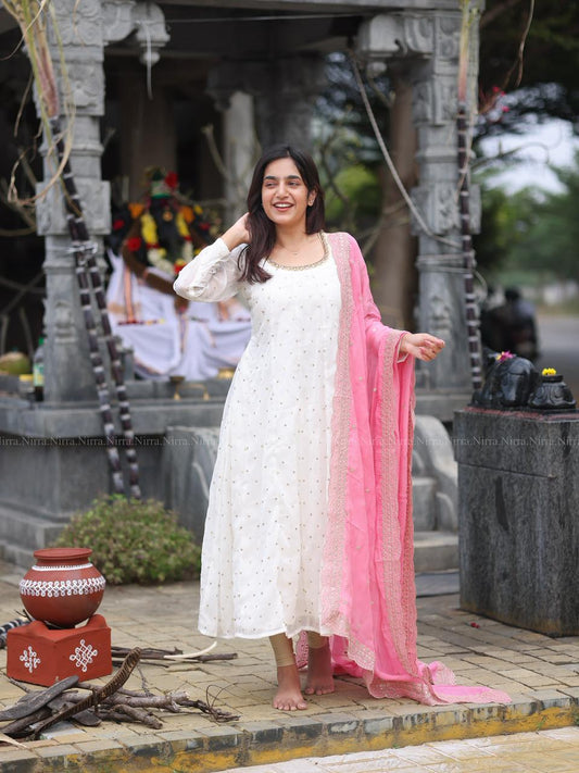 White georgette Anarkali with crystal lace work paired with embroidery baby pink organza shawl