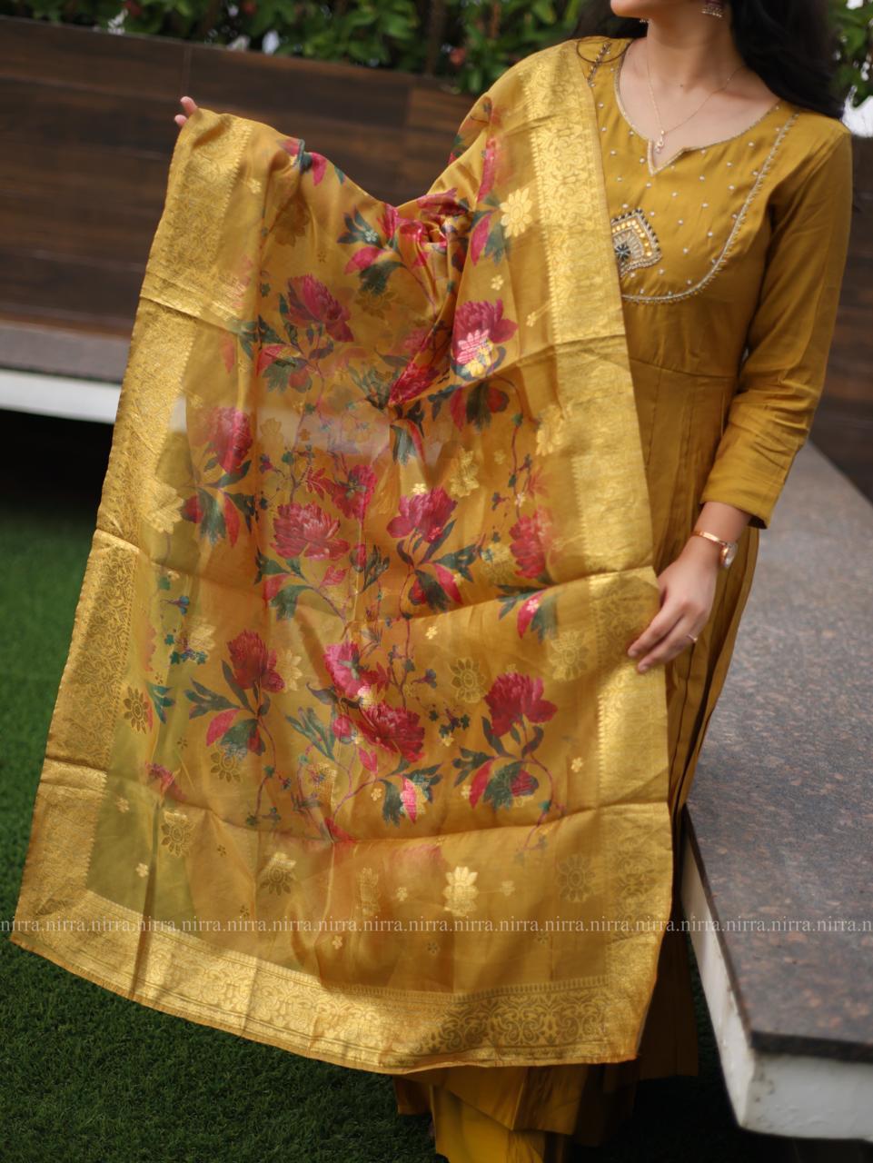 Mustard semi silk Anarkali top with palazzo pants paired with floral organza shawl