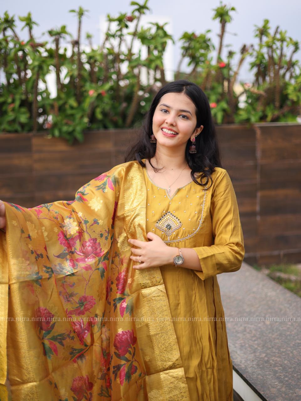 Mustard semi silk Anarkali top with palazzo pants paired with floral organza shawl