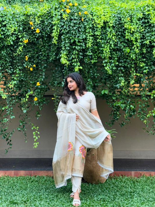 Onam collection-Ivory silk set with flower embroidery