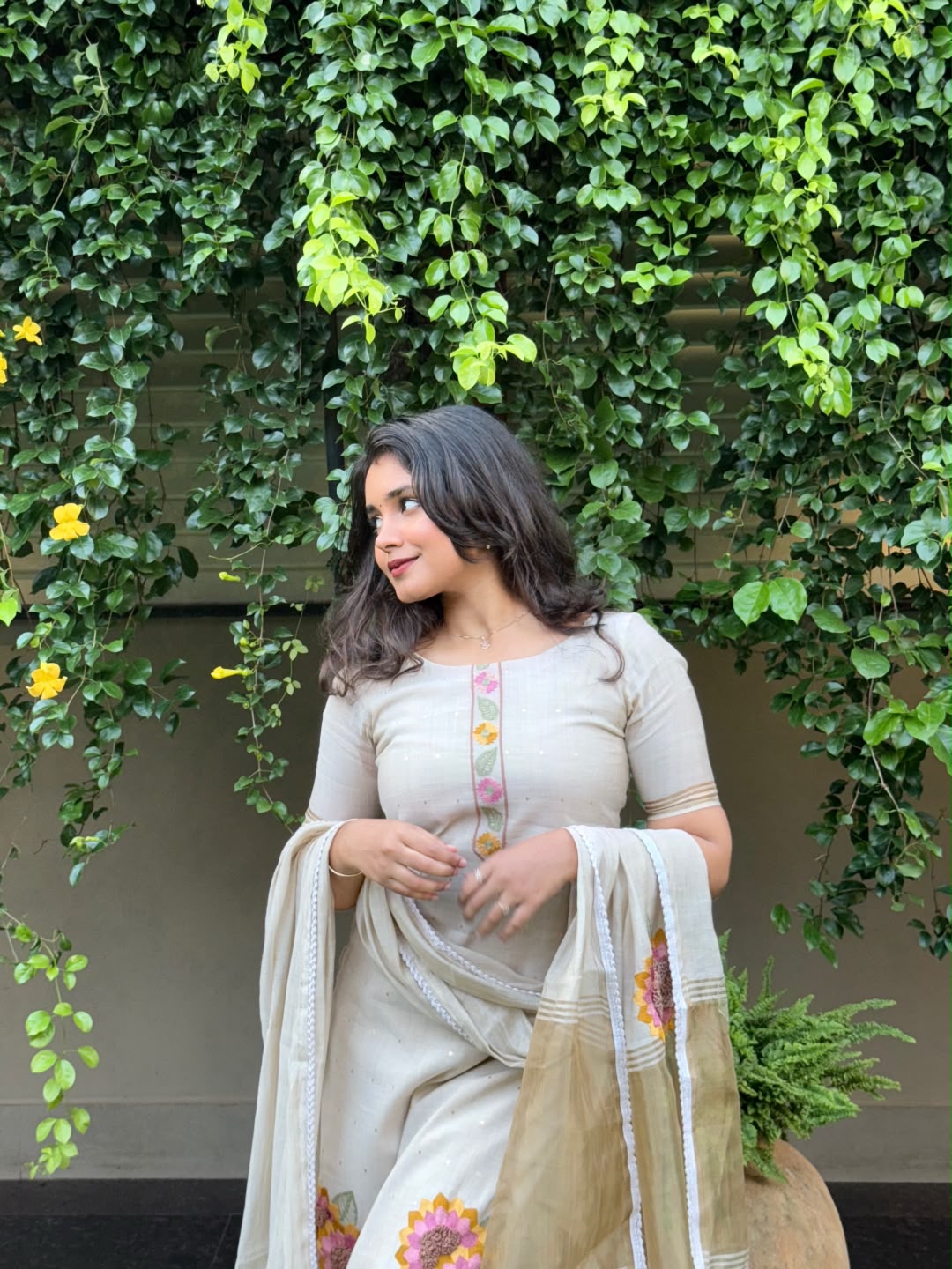Onam collection-Ivory silk set with flower embroidery