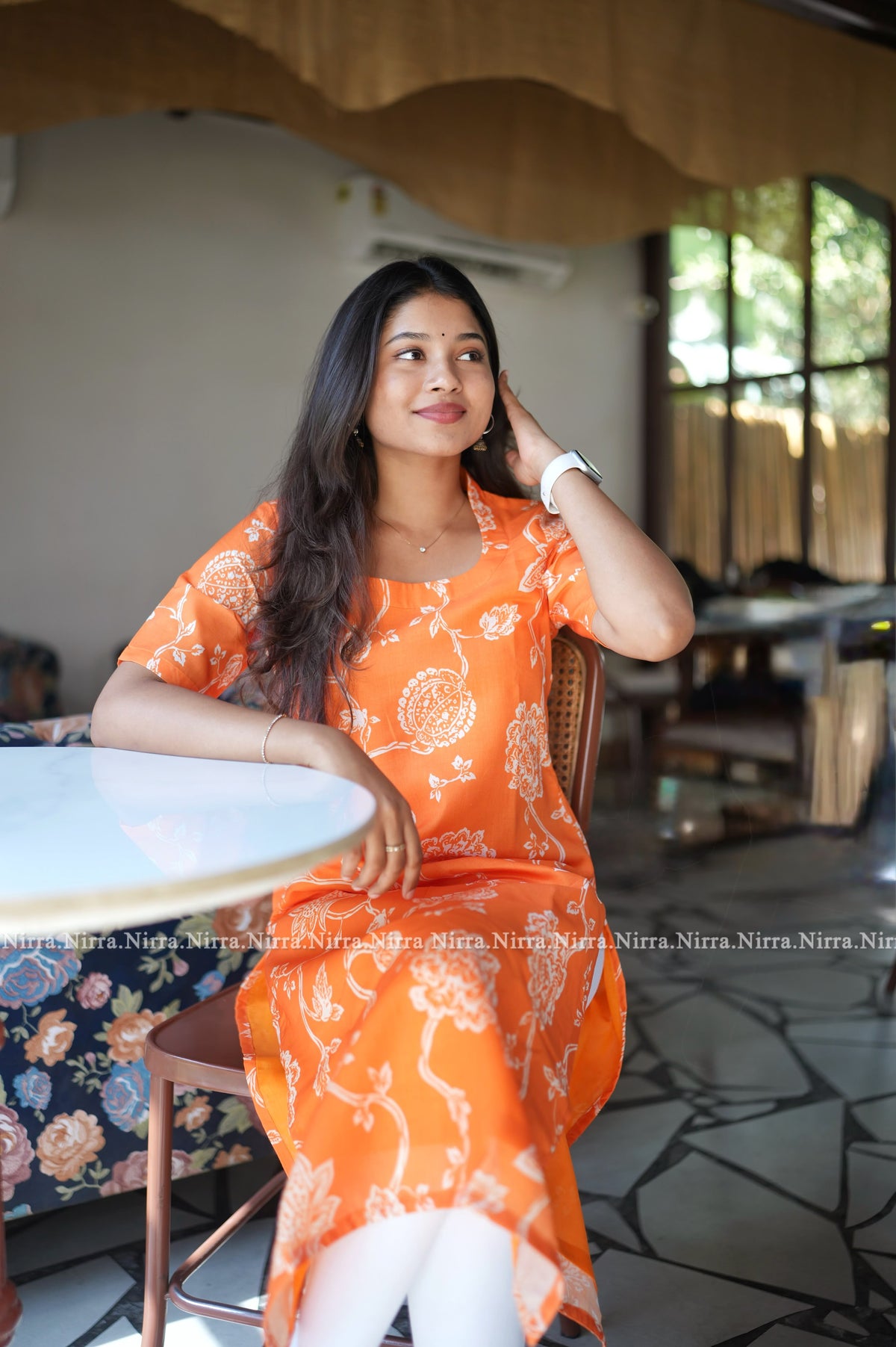 Orange floral print cotton kurti with halter neck