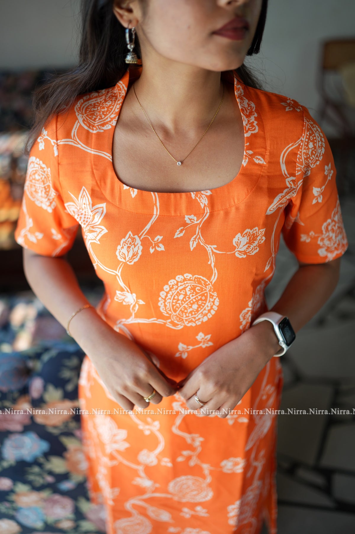 Orange floral print cotton kurti with halter neck
