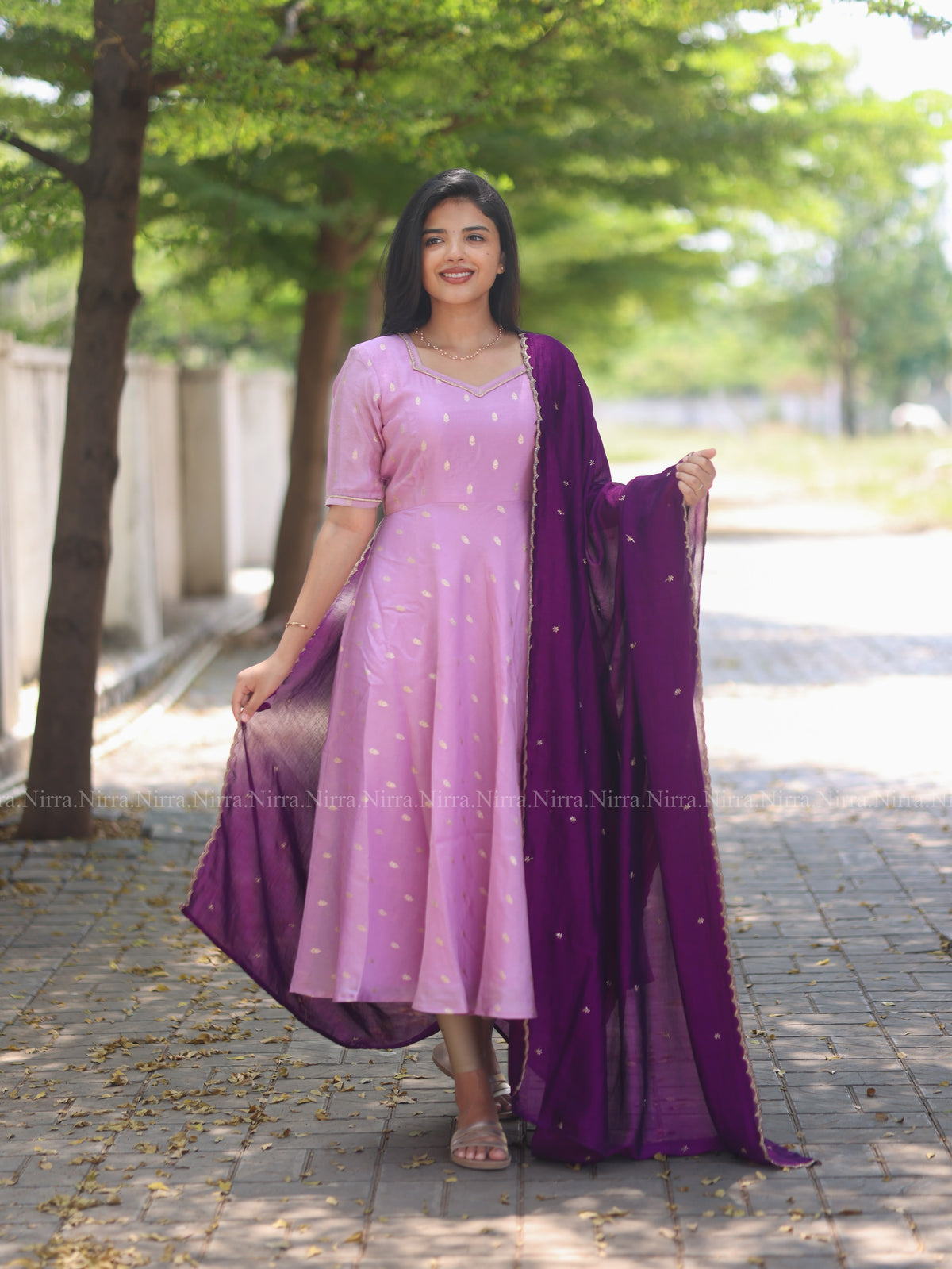 Lilac tissue umbrella cut Anarkali paired with purple vichitra silk shawl